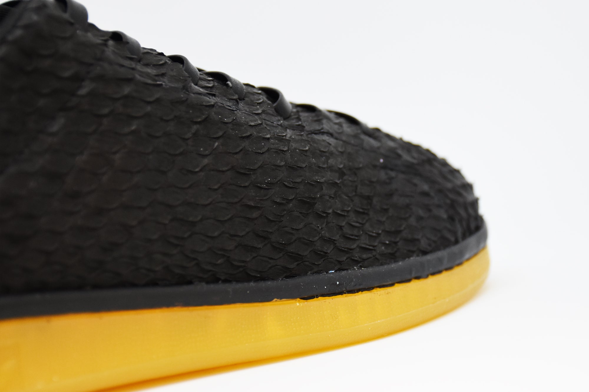 Stan Smith black python custom sneaker with an icy sole.